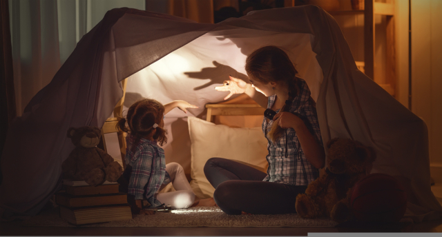 Mother,Scares,Child,Daughter,Tells,Scary,Stories,,Plays,In,The