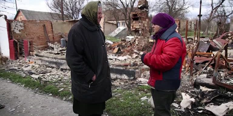 Behind enemy lines, Ukrainian grandmother survives Russian occupation with her chickens