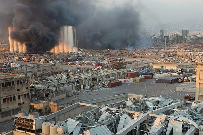 Smoke rises from the site of an explosion in Beirut