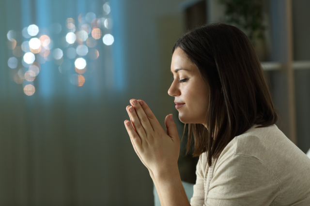 PRAY-WOMAN-CHURCH-shutterstock_1822640993