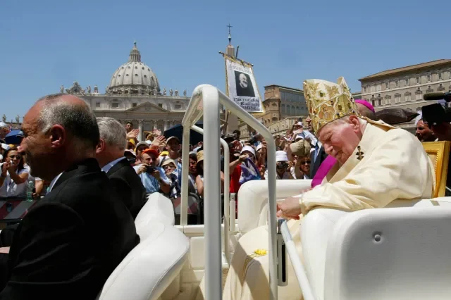 Pope-John-Paul-II-leaves-St-Peters-square-at-the-end-of-a-ceremony-to-make-Italian-priest-Padre-Pio-a-saint-AFP-000_APP2002061622420