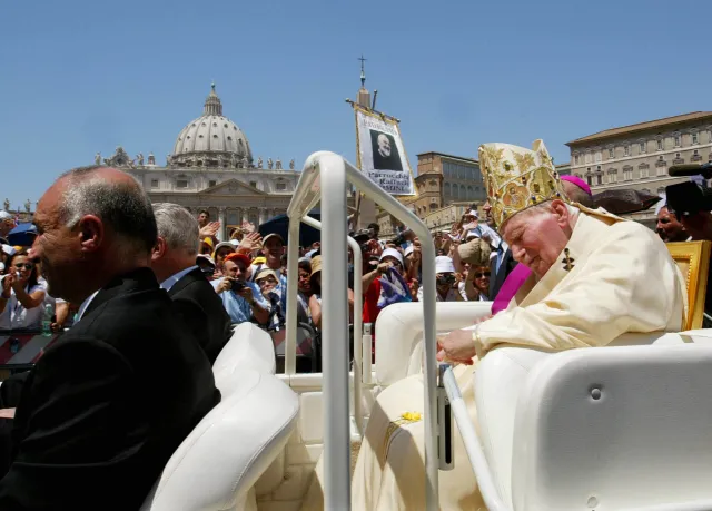 Pope-John-Paul-II-leaves-St-Peters-square-at-the-end-of-a-ceremony-to-make-Italian-priest-Padre-Pio-a-saint-AFP-000_APP2002061622420